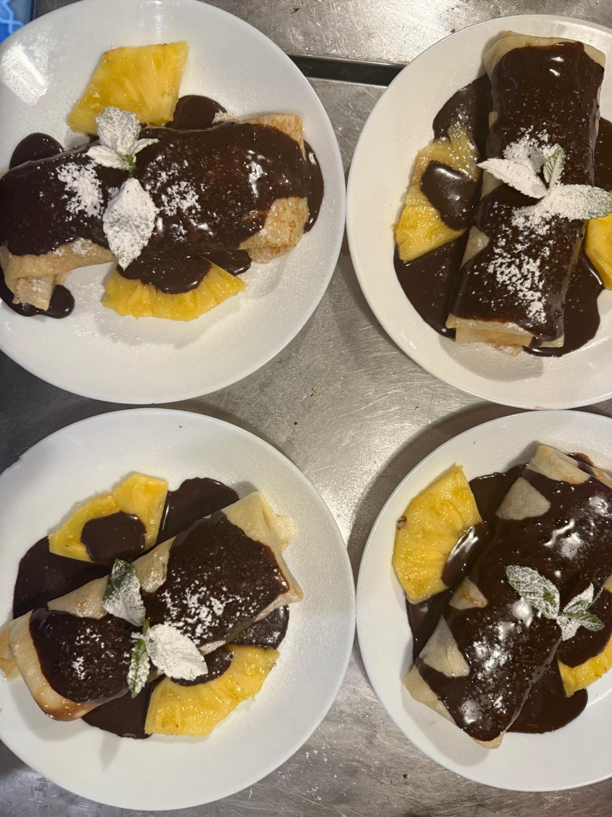 Dessert plates with chocolate sauce at Moorish Lounge