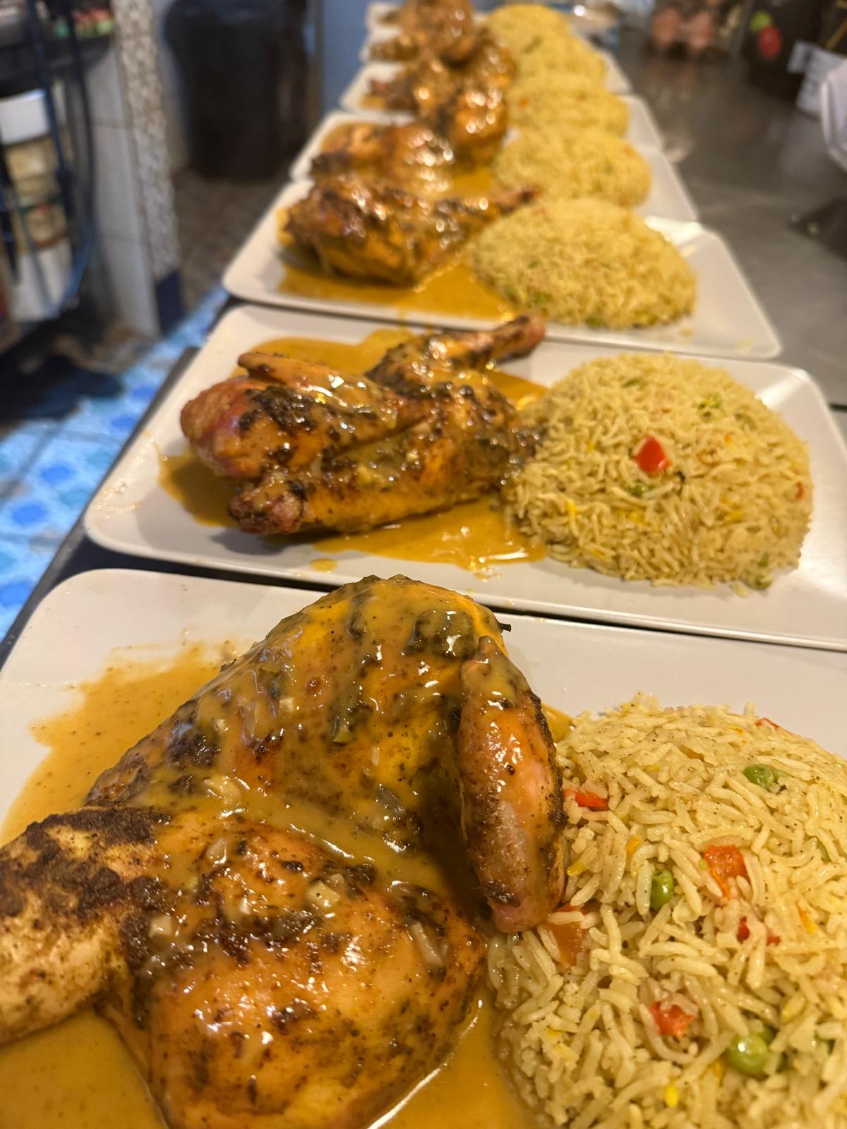 Chicken and rice plates ready for service at Moorish Lounge